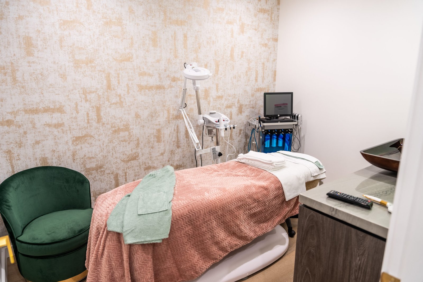 Glow Aesthetic Center treatment room with skincare equipment